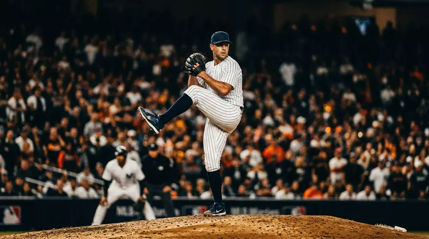 Major League pitcher mid-delivery on a floodlit mound during a night game, illustrating how starting pitchers shape an MLB totals line.